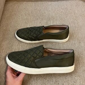 Green quilted slip on sneakers